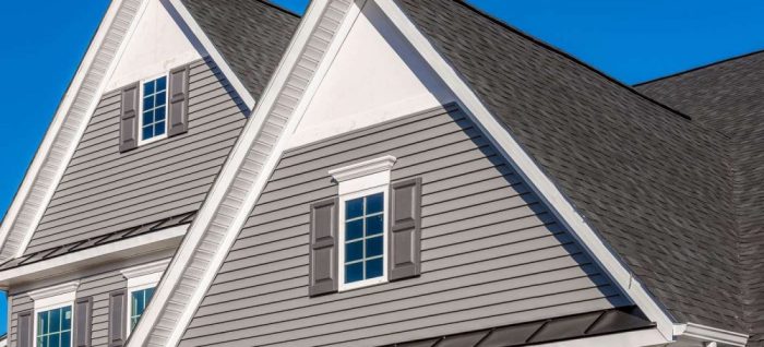 Green House with J M Exteriors Roofing Siding